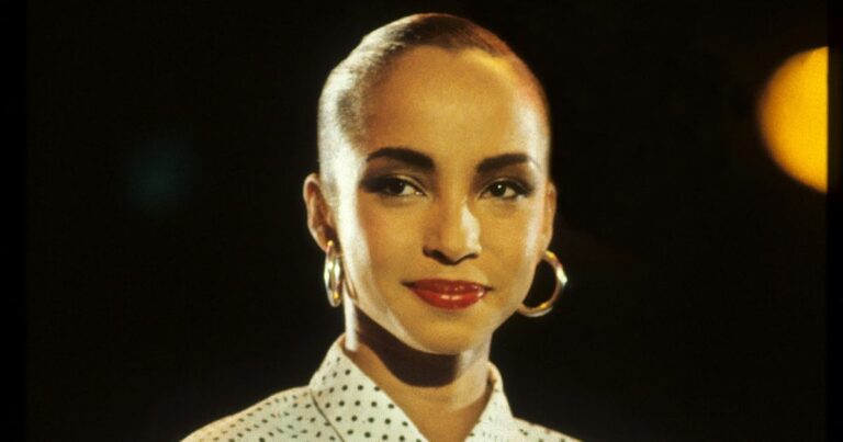 sade performs on stage