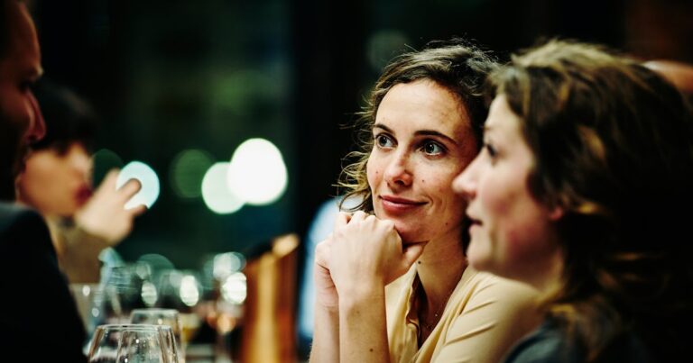 smiling woman in conversation