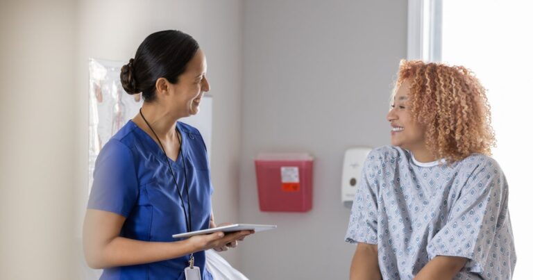 a physician gently examines