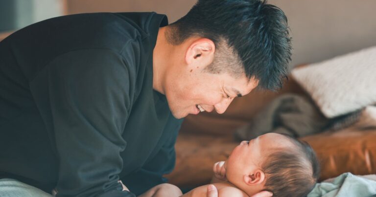 asian father holding a